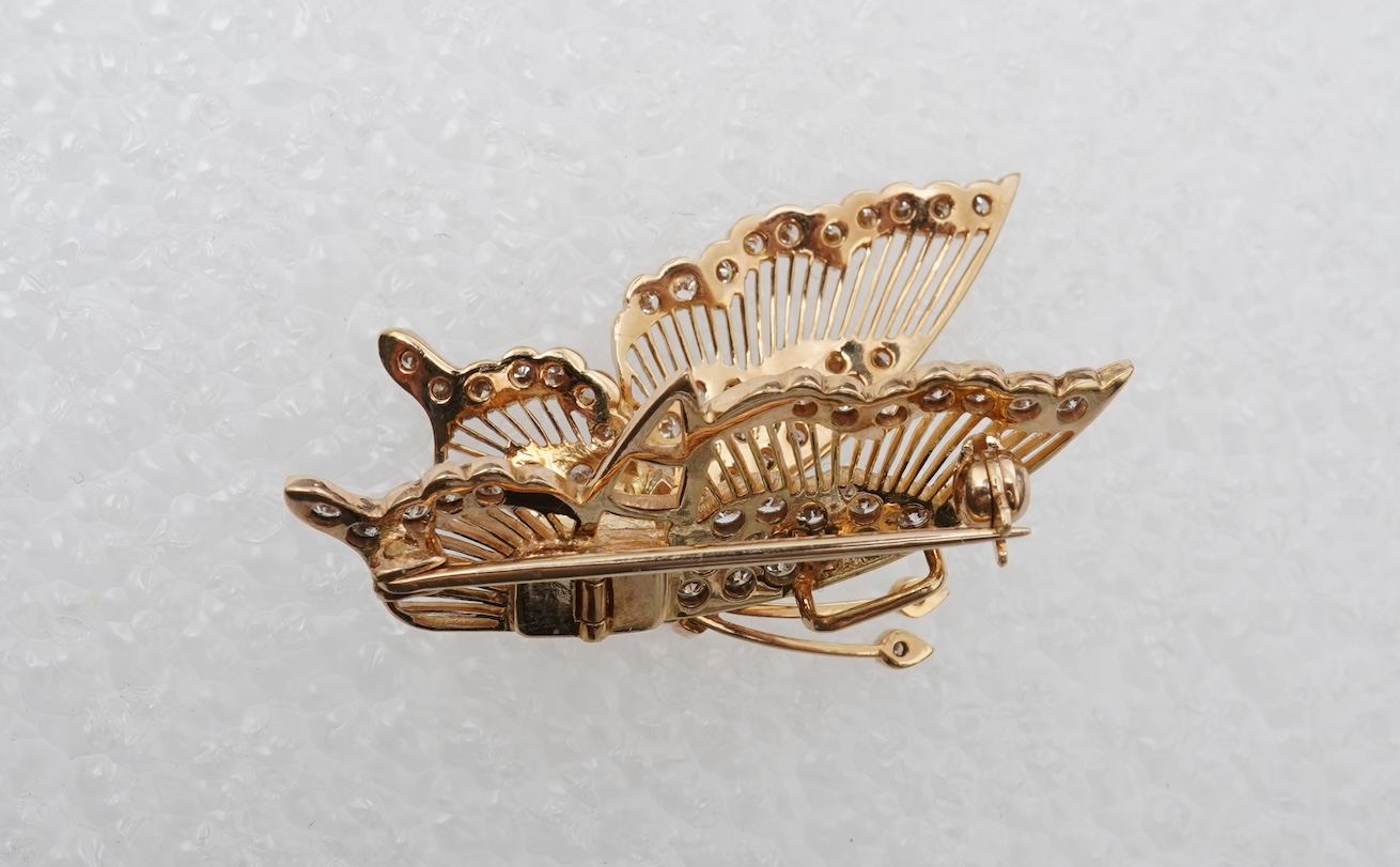 A diamond butterfly brooch